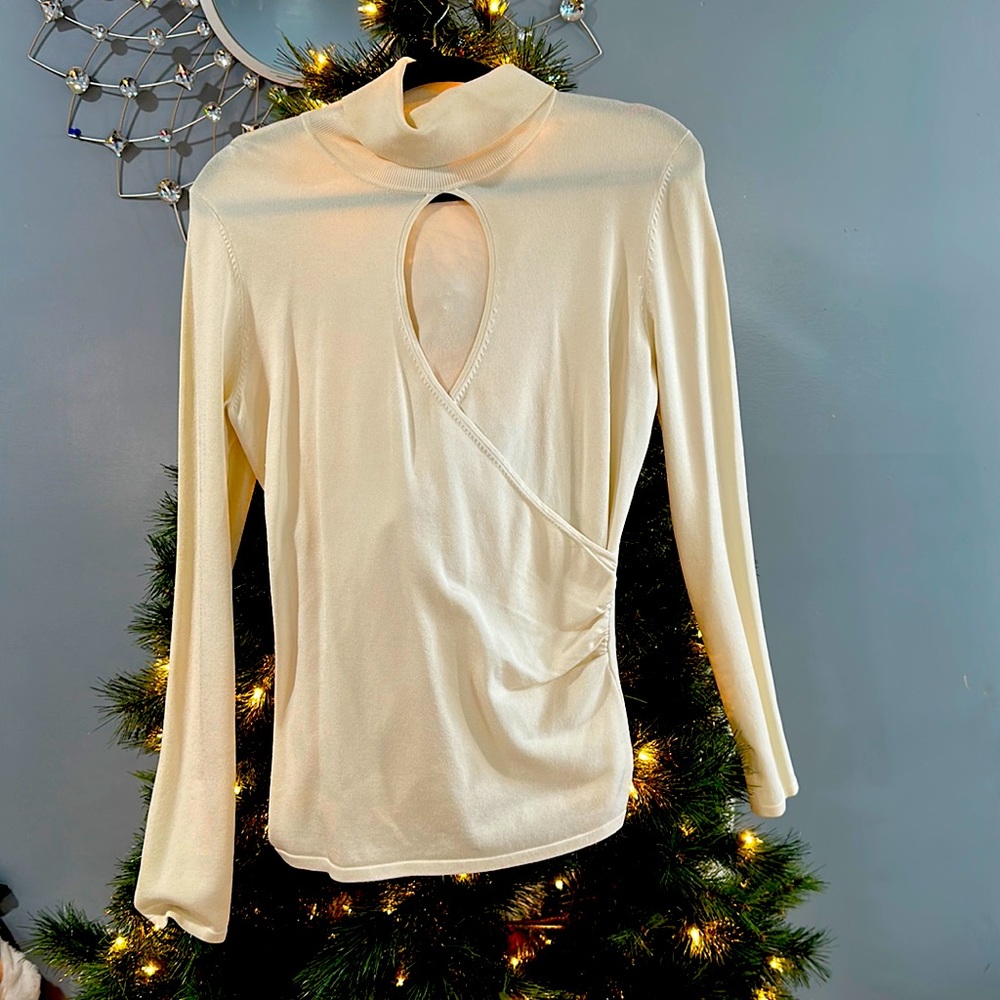 Cream cut out turtle neck from Cachè